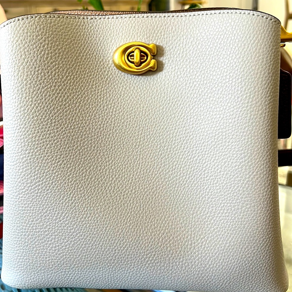 COACH small, carry all purse.